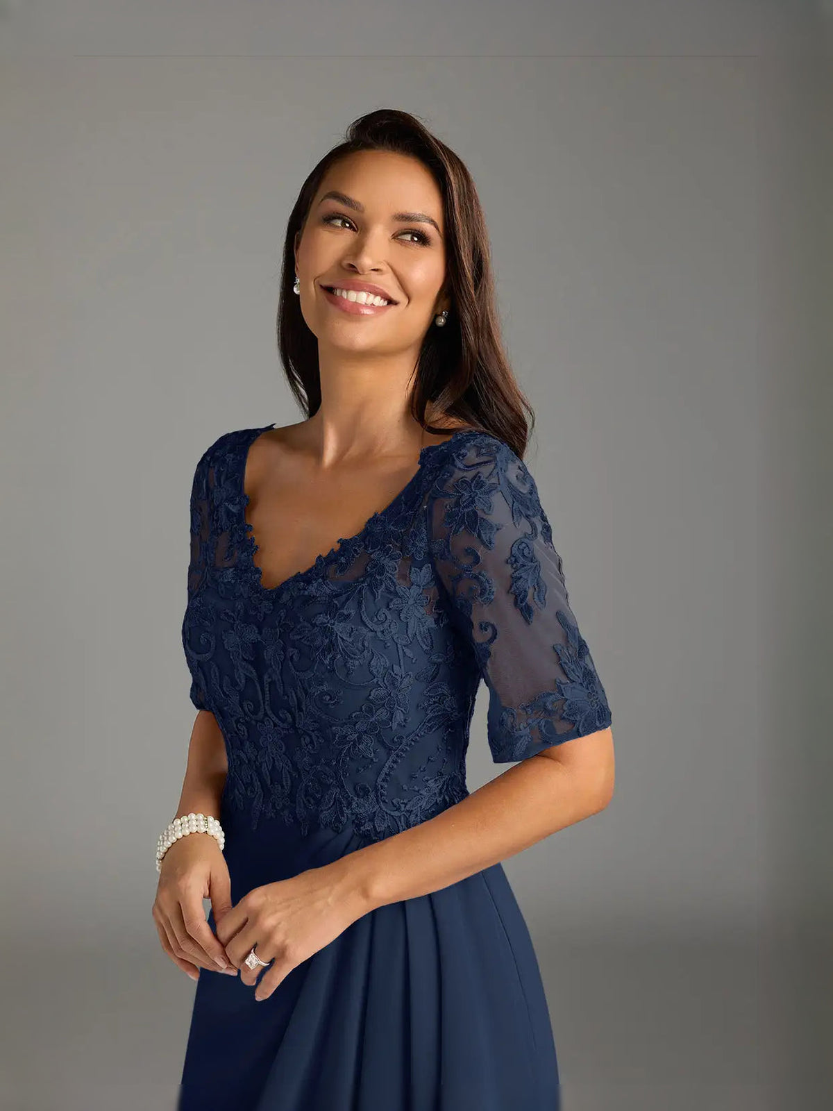 Dark navy embroidered lace V-neck maxi dress with short sleeves and fitted bodice