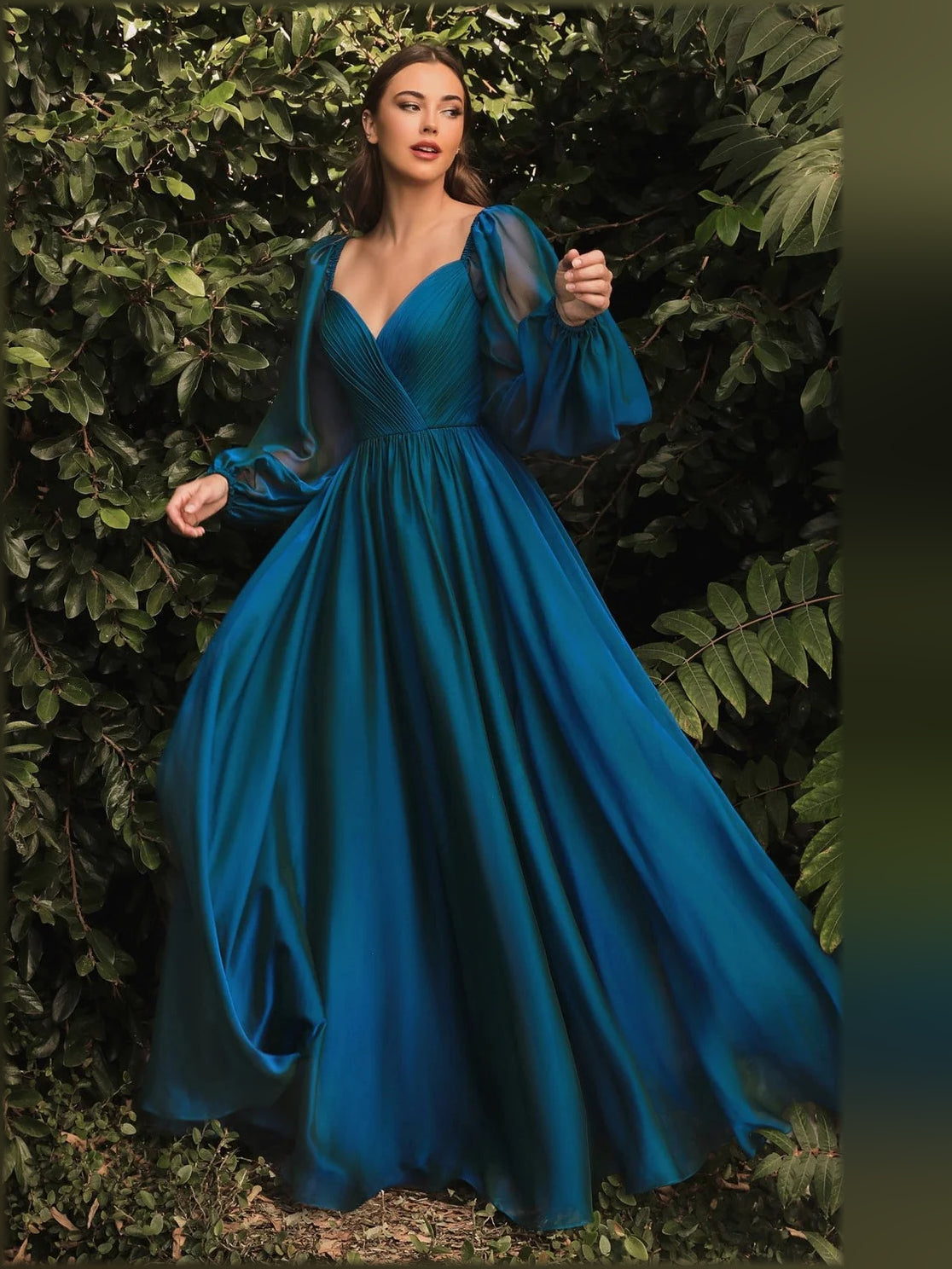 Teal V-neck formal dress with long puff sleeves and pleated floor-length skirt