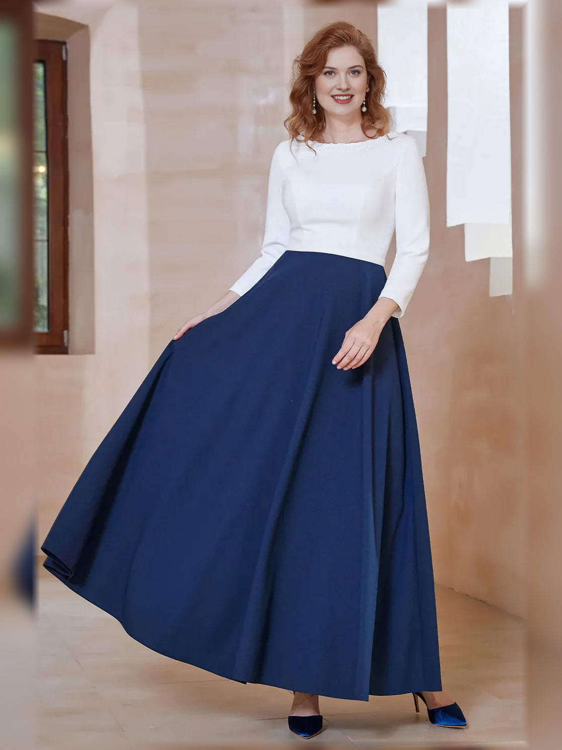Mother of the bride A-line dress with boat neckline, navy skirt and long white sleeves