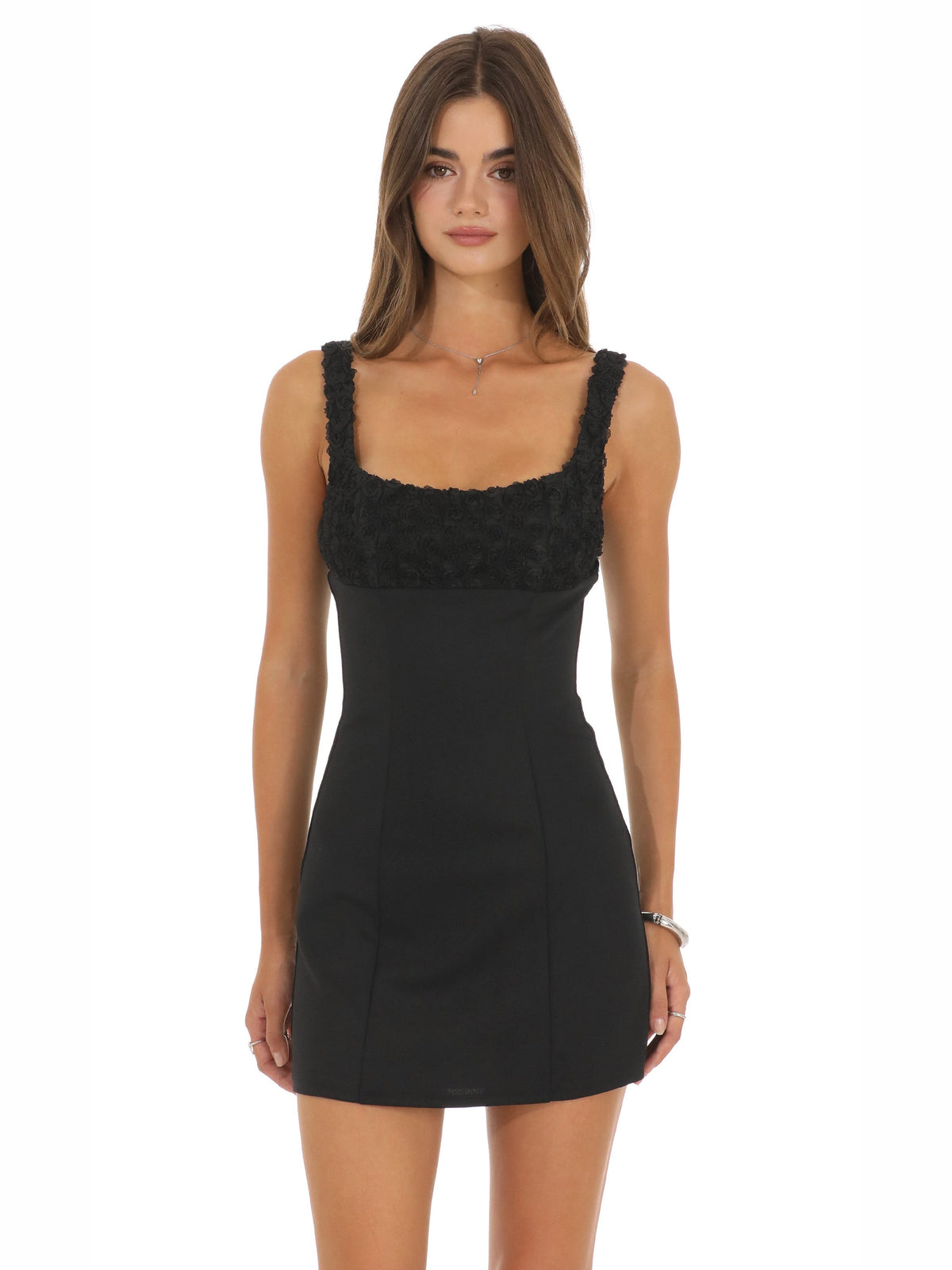 Black homecoming dress with structured woven fabric construction and mini hem