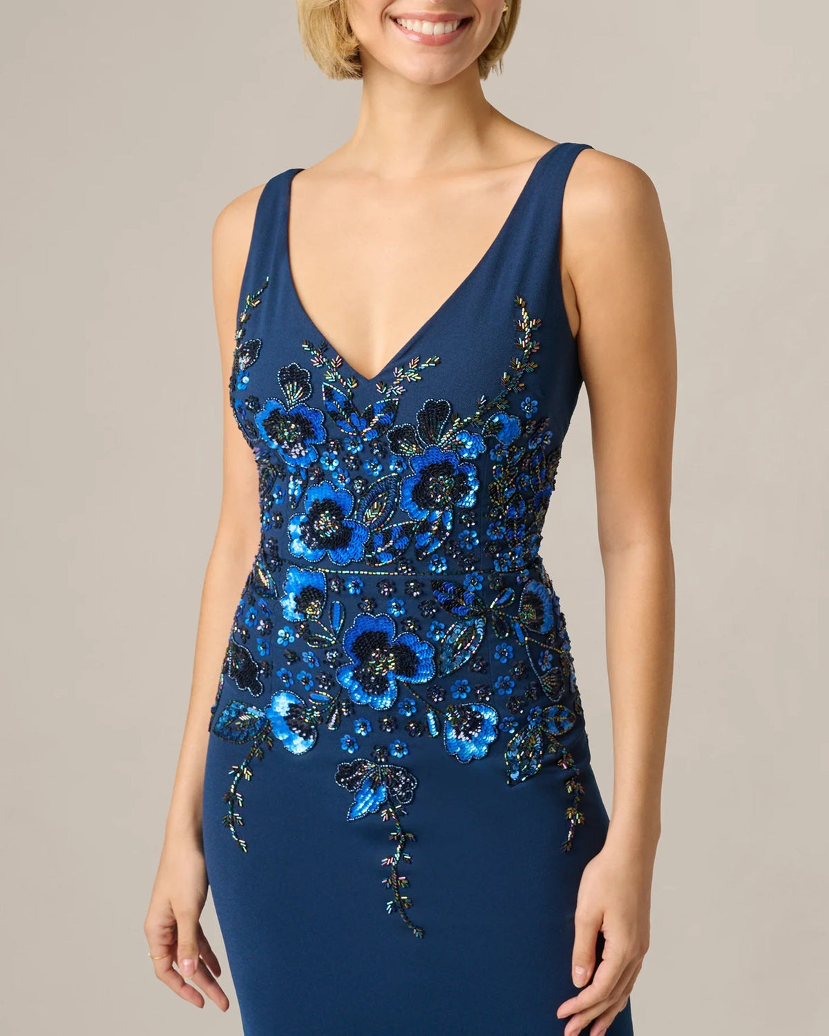 Light navy blue V-neck sleeveless dress with blue floral sequin embroidery bodice