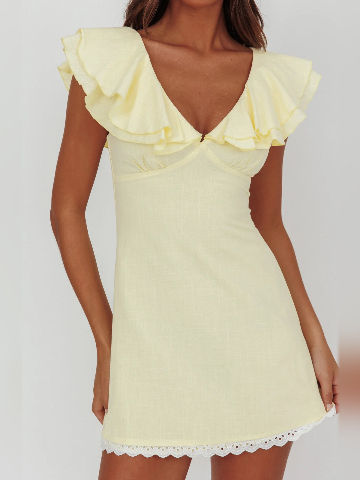 Butter layered ruffled mini dress with V neckline and scalloped ruffle shoulders