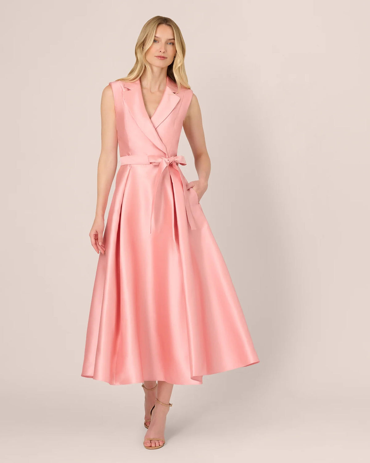 Apricot pink sleeveless A-line maxi dress with V-neck wrap and sash-tie waist