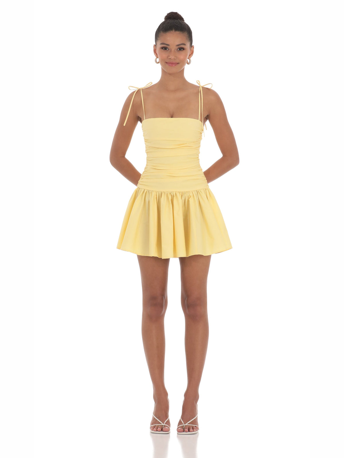 Yellow homecoming dress with structured woven fabric construction and maxi hem