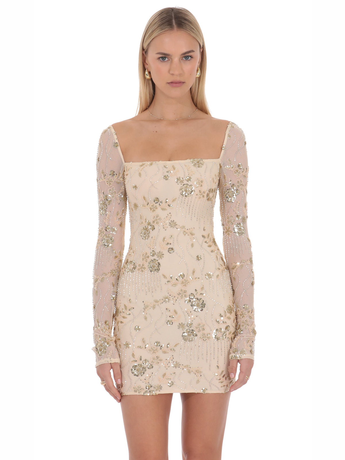Champagne homecoming dress with structured woven fabric construction and mini hem