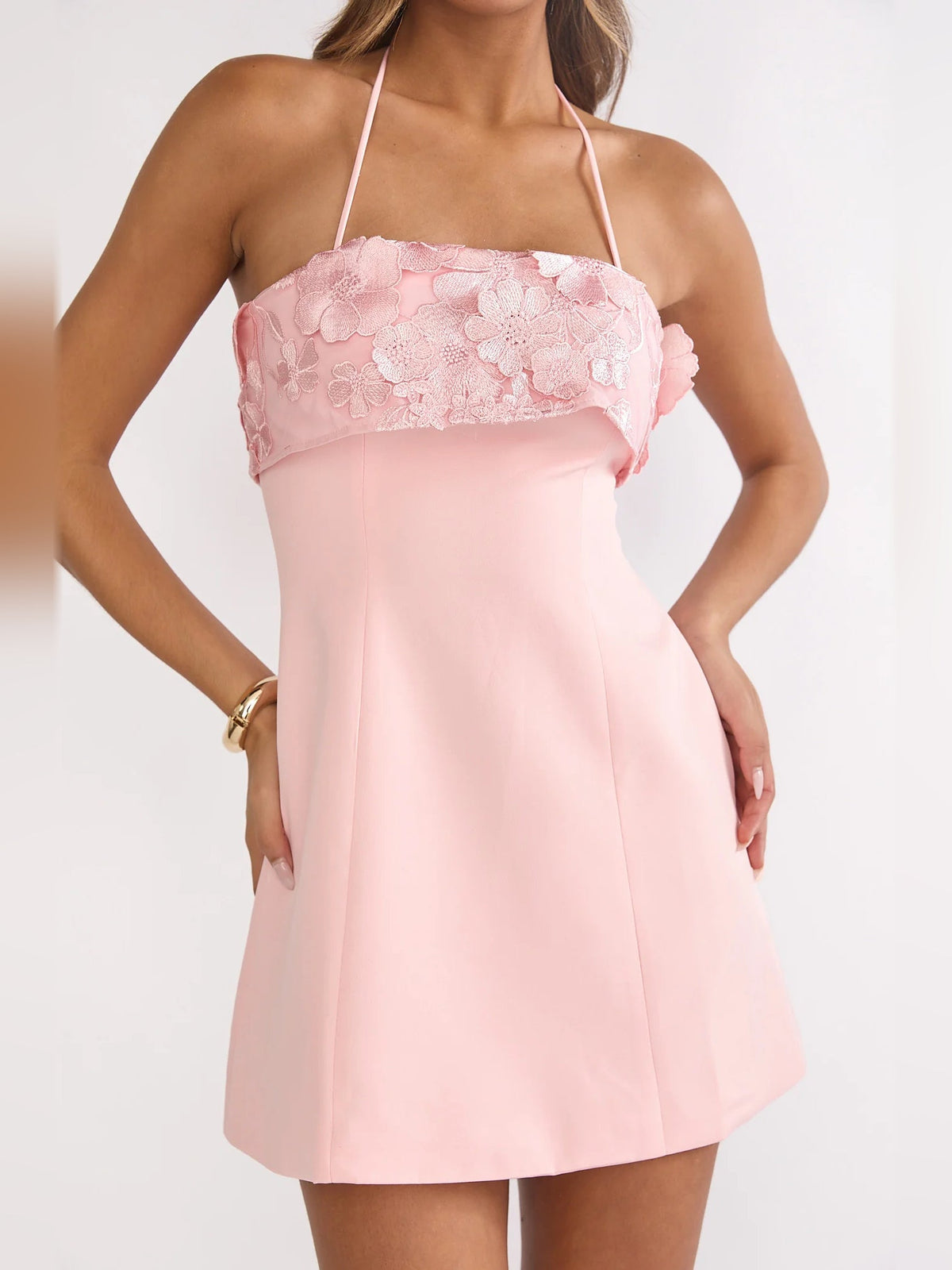 Blush mini homecoming dress with floral lace ruffle bust and thin spaghetti straps