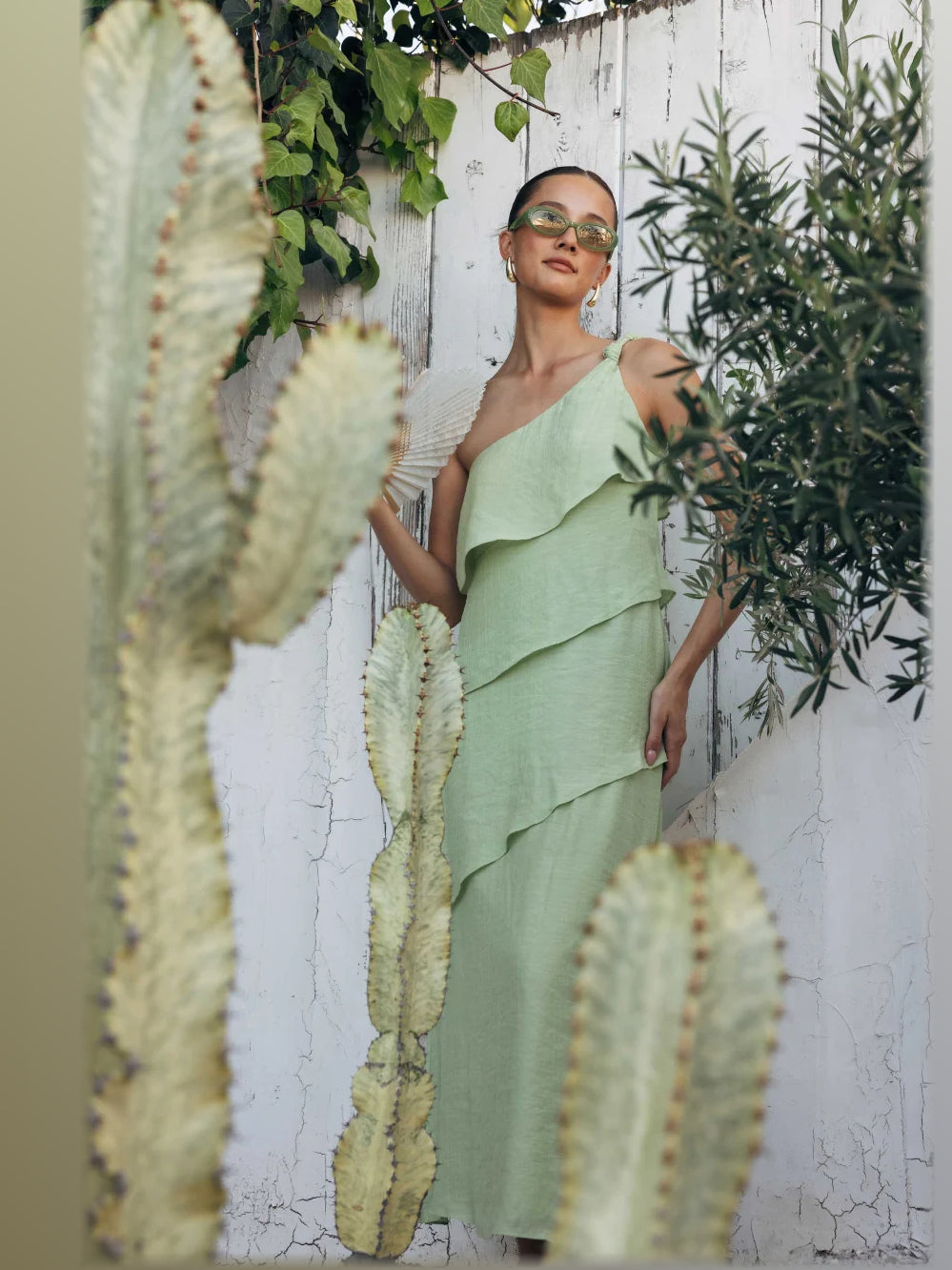 Sage formal dress with structured woven fabric construction and maxi hem