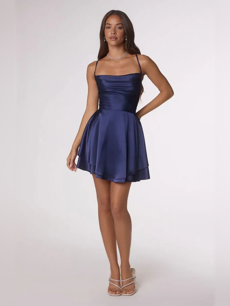Navy satin mini homecoming dress with straight draped bodice and tiered skirt