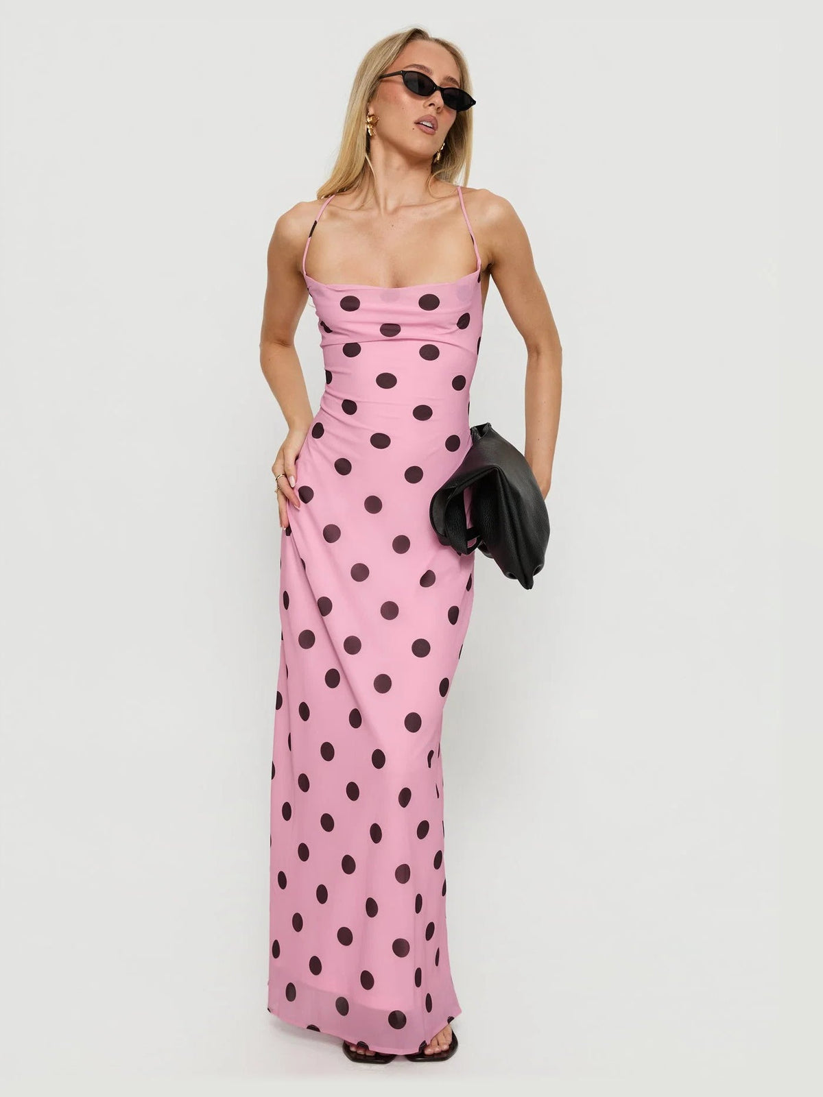 Pink formal dress with structured woven fabric construction and maxi hem