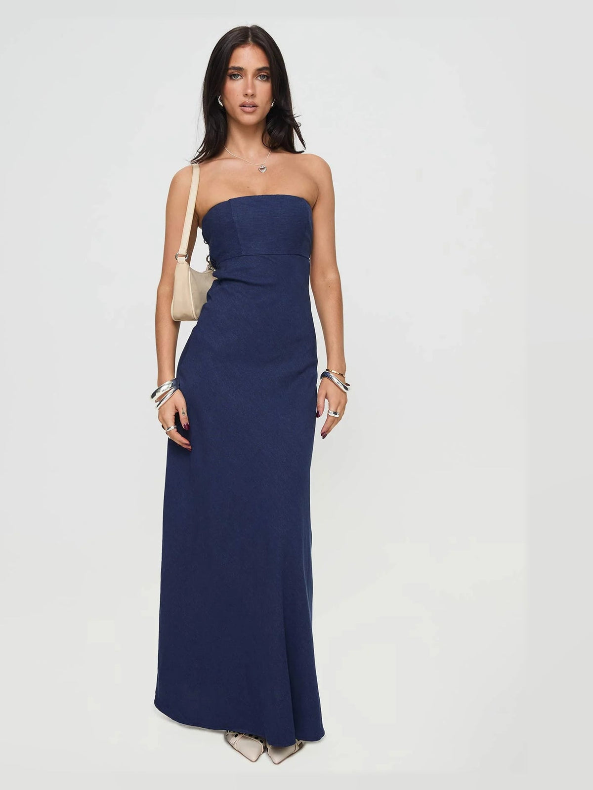 Navy formal dress with structured woven fabric construction and maxi hem