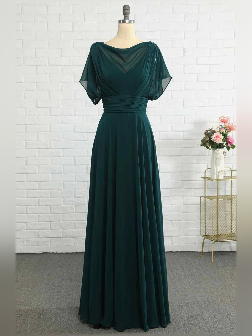 Peacock cowl-neck formal dress with ruched waist and wide pleated skirt, short sleeves