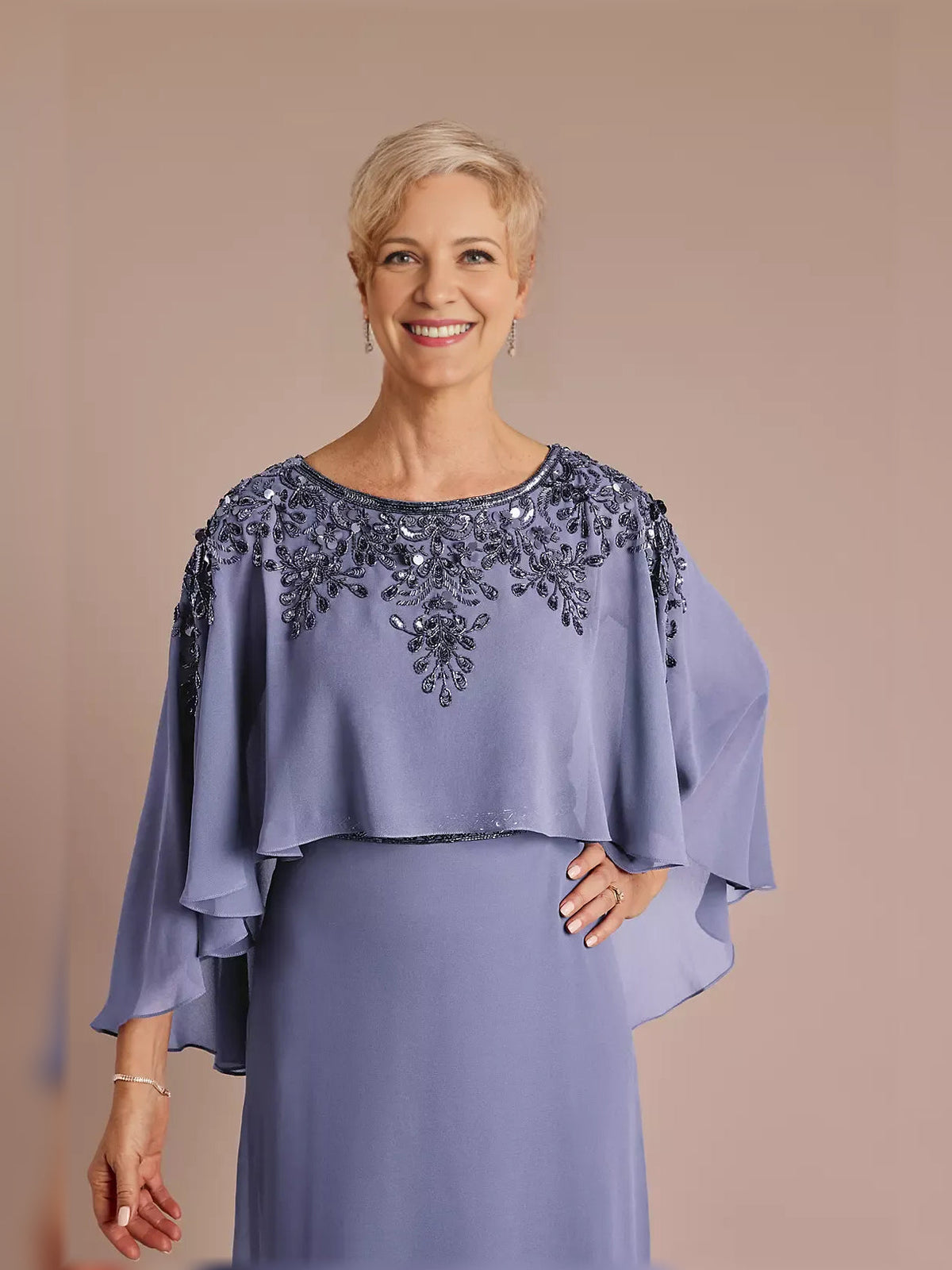 Periwinkle chiffon dress with beaded shoulder yoke and layered cape sleeves