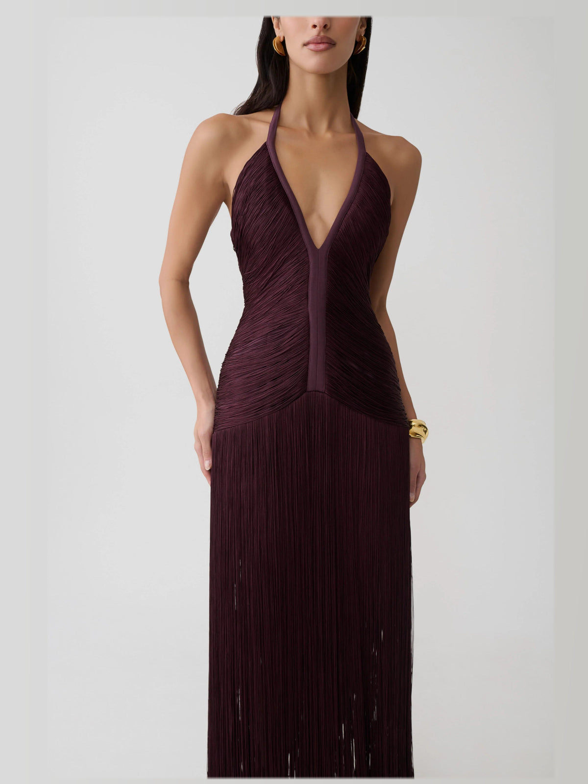Plum formal dress with structured woven fabric construction and maxi hem