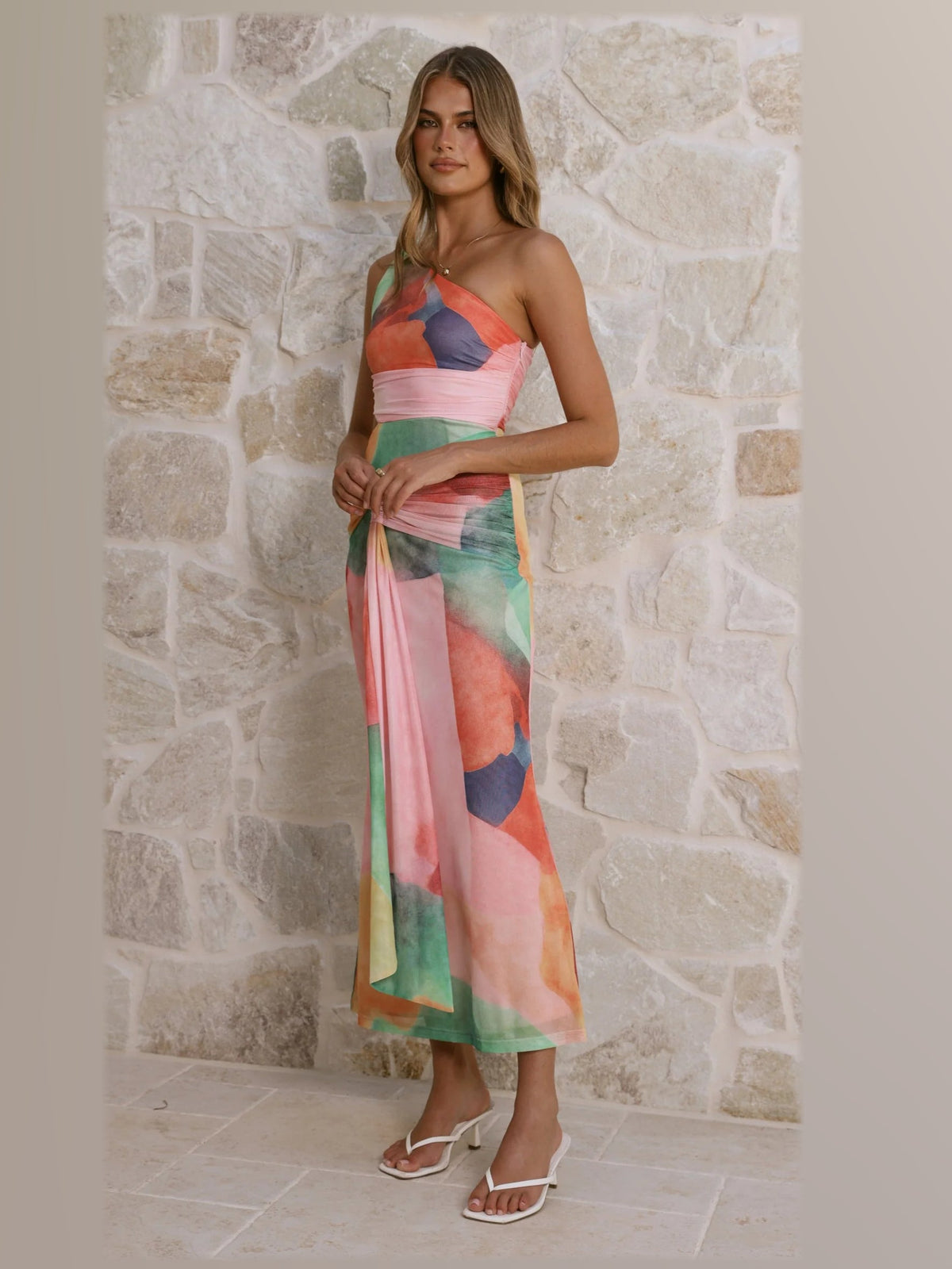 Pink formal dress with structured woven fabric construction and maxi hem