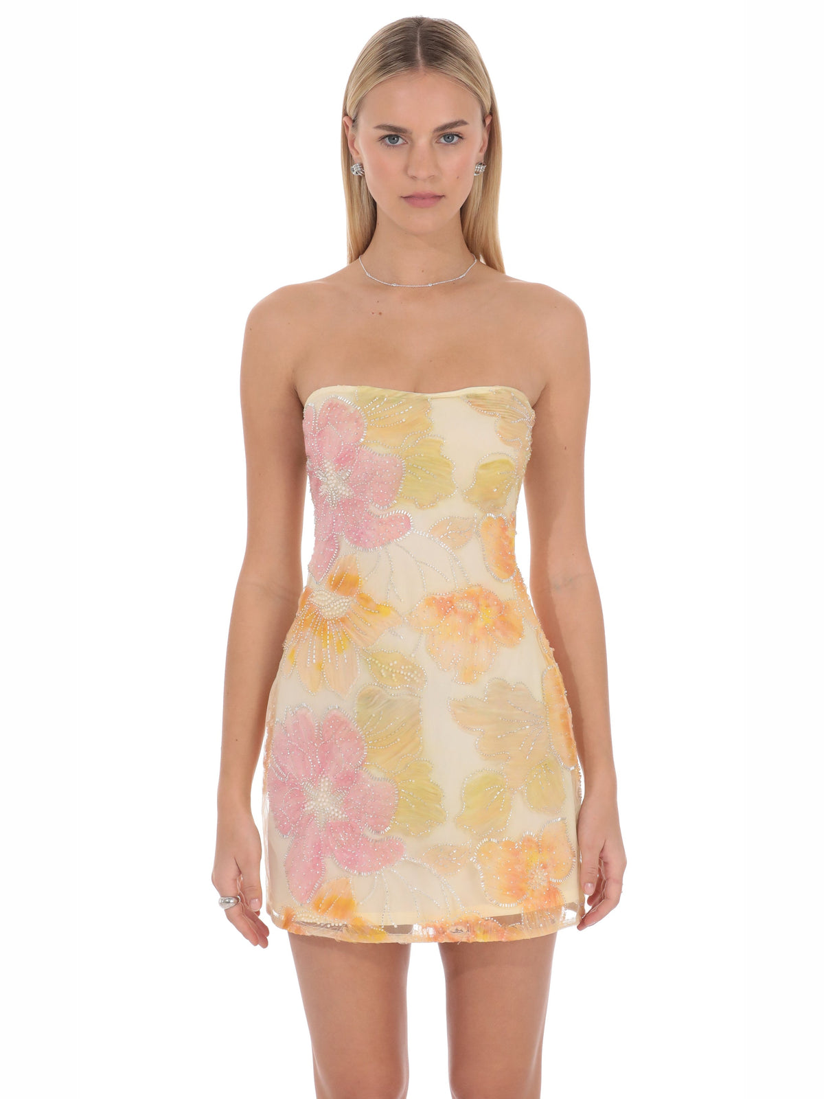 Cream homecoming dress with structured woven fabric construction and mini hem