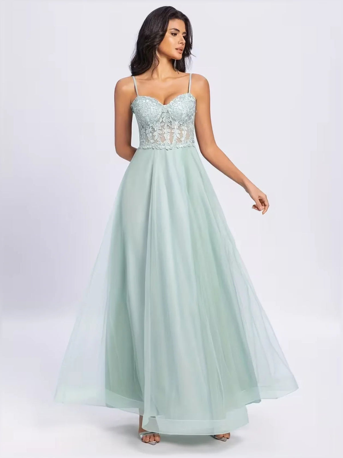 Mint green strapless gown with lace sweetheart bodice and flowing floor-length skirt