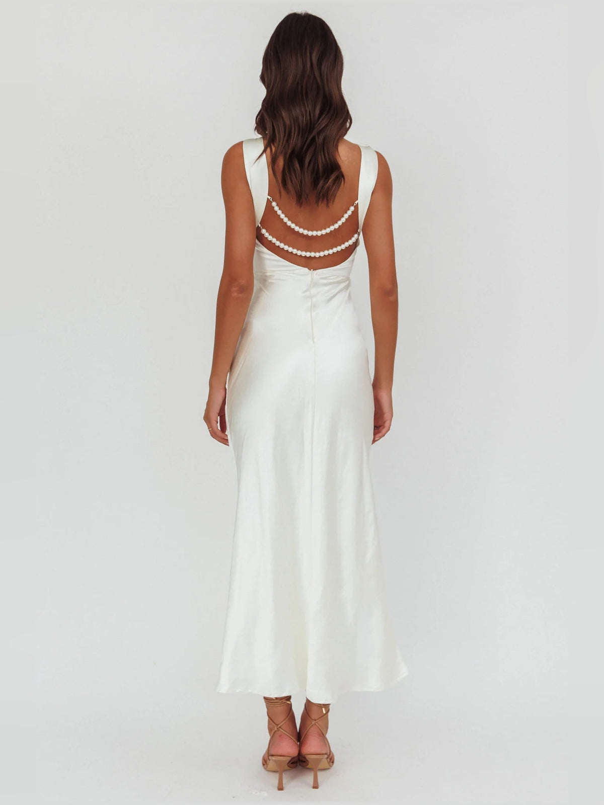 White sleeveless midi formal dress with pearl beaded back yoke and open back