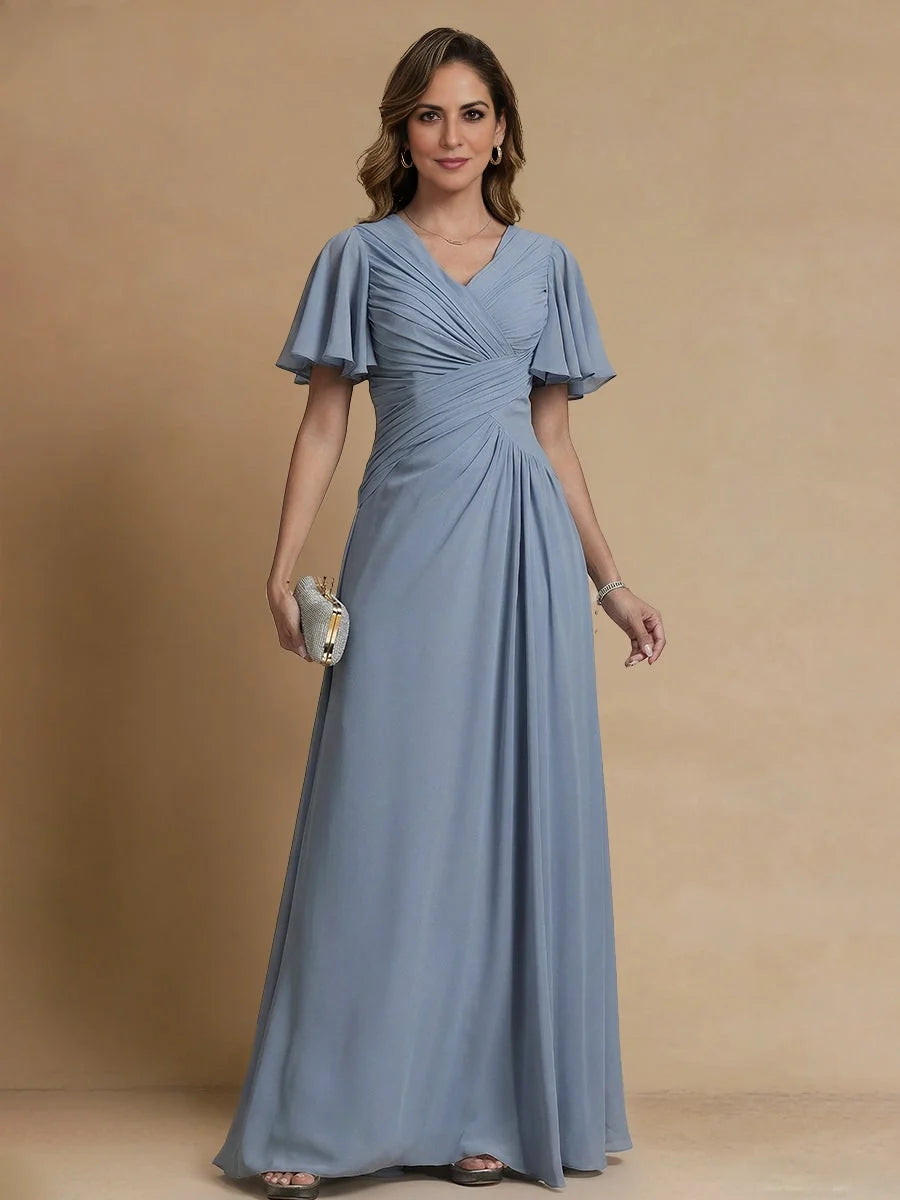 Dusty blue chiffon maxi dress with draped ruched bodice, V-neck, and flutter sleeves