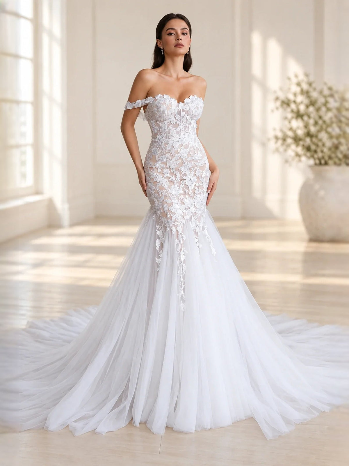 White off-shoulder wedding dress with sweetheart neckline and floral applique mermaid silhouette