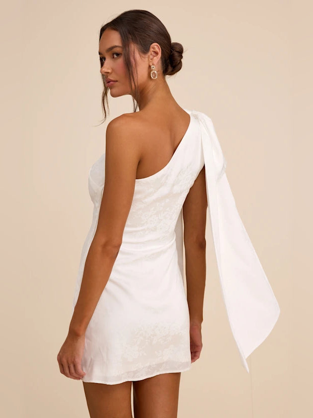 White mini one-shoulder satin dress with open back and draped sash