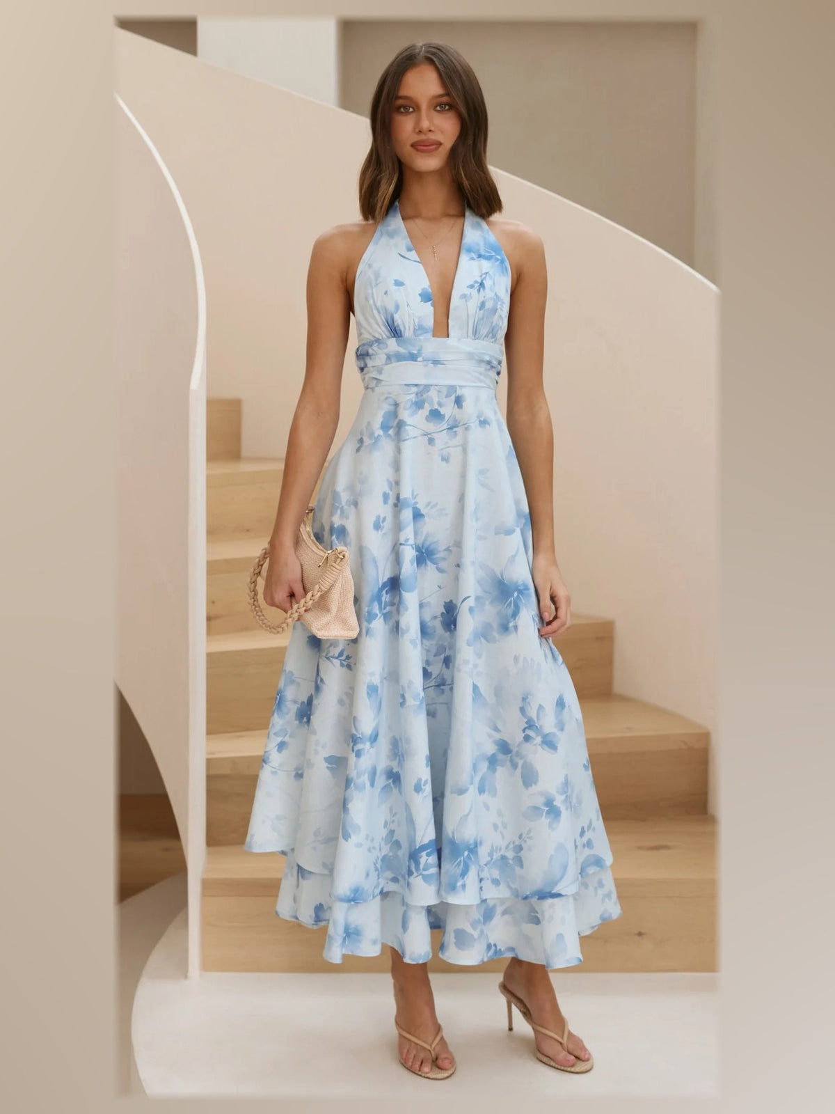 Ivory formal dress with structured woven fabric construction and maxi hem