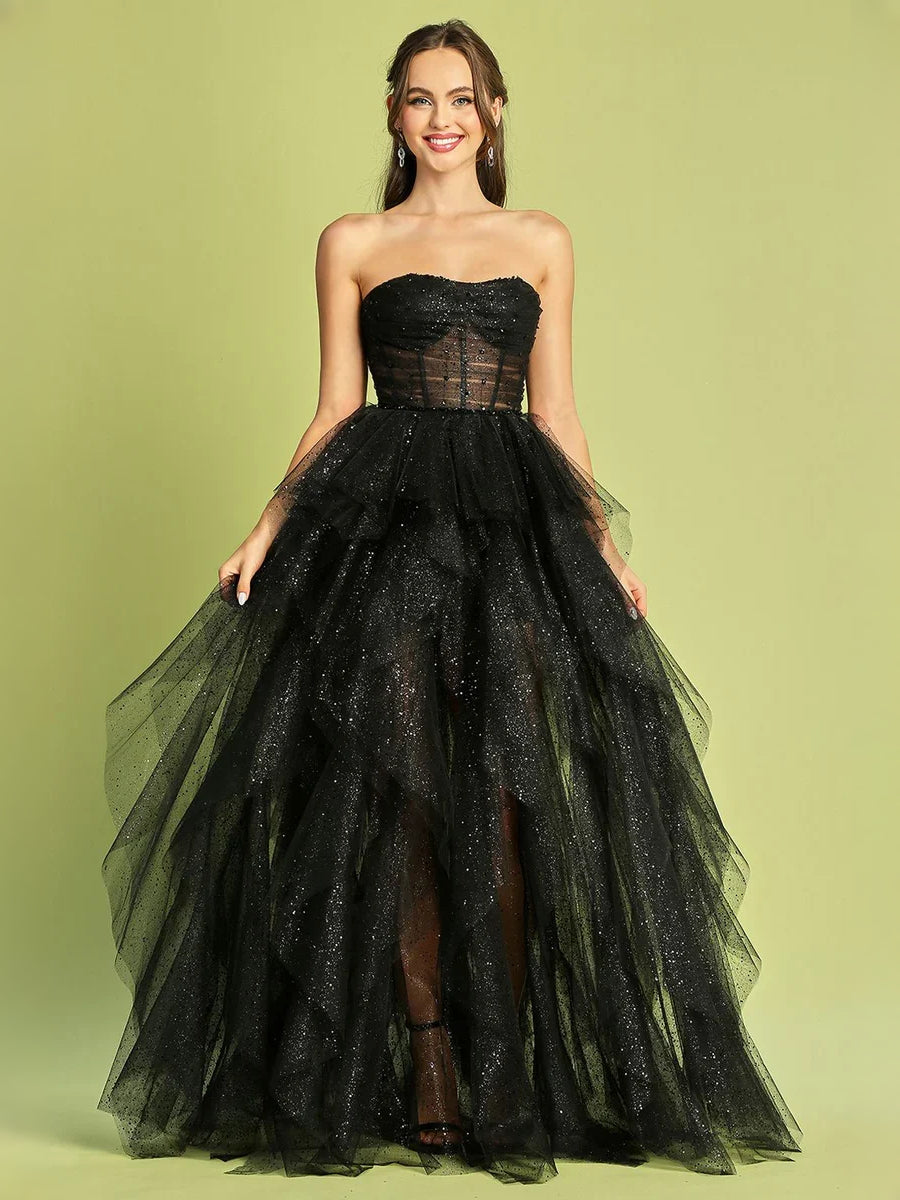 Black strapless corset prom dress with ruched bodice and full A-line glitter tulle skirt