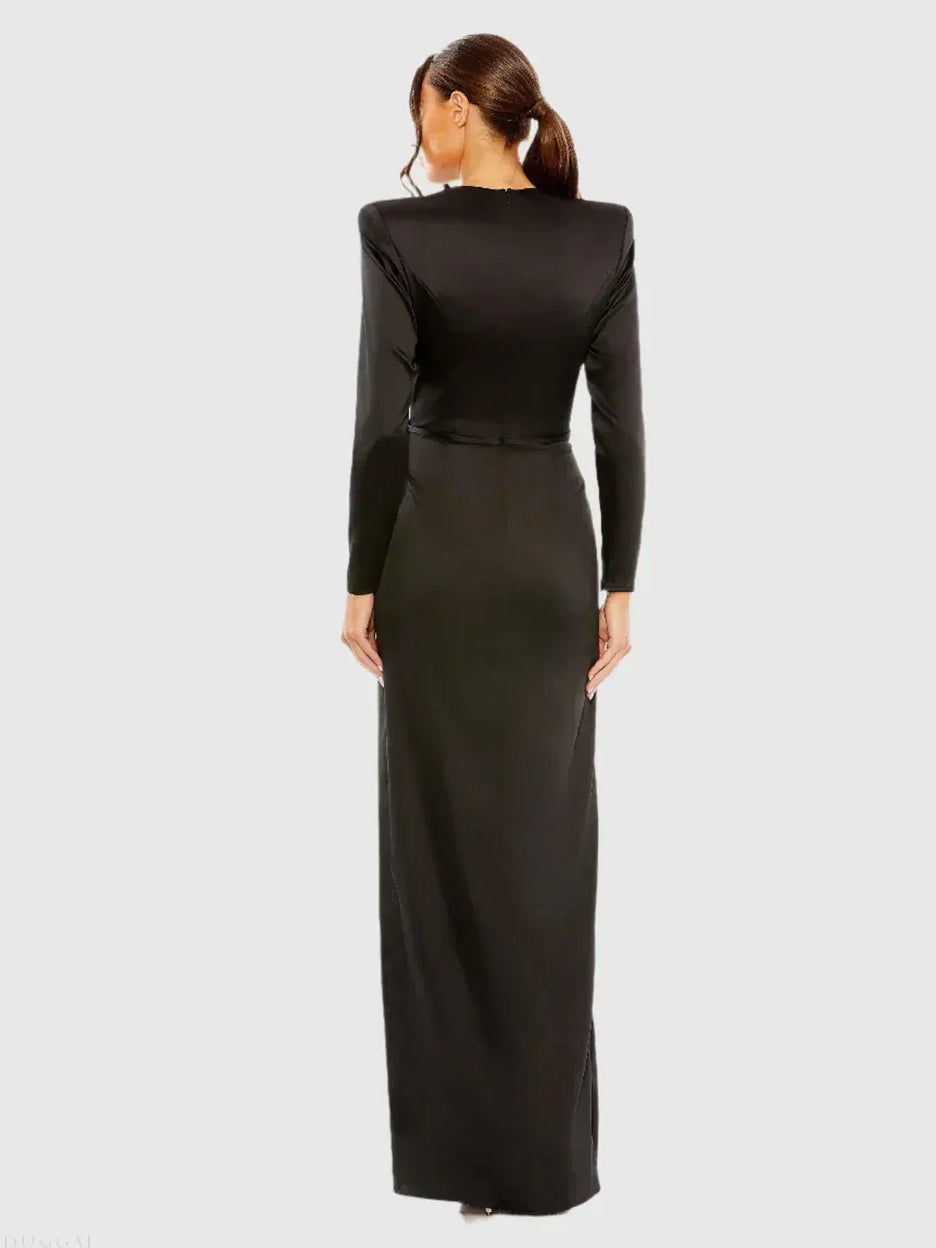 Floor-length formal dress in black, back view, long sleeves, fitted sheath with leg slit