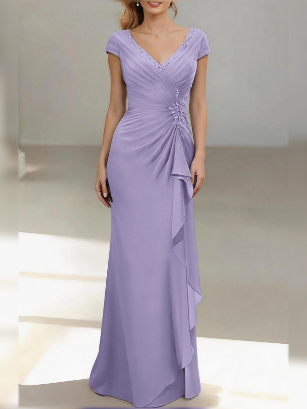Lilac V-neck ruched mermaid gown with cap sleeves and draped ruffle skirt