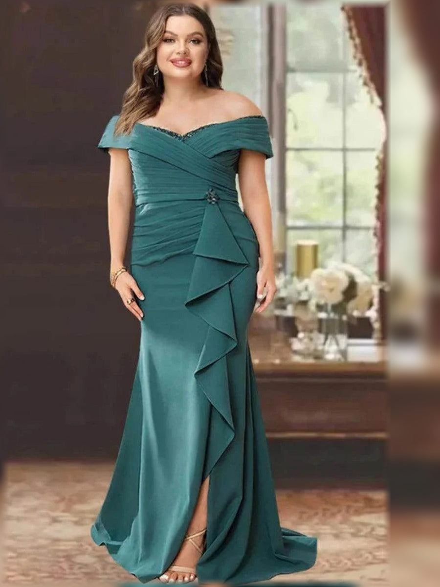 Teal off-shoulder floor-length mermaid gown with ruched bodice and cascading ruffle panels.
