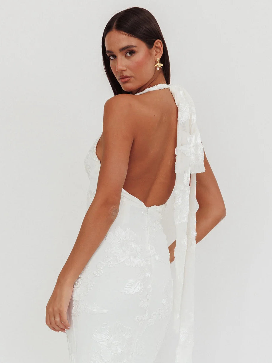 White formal dress with structured woven fabric construction and maxi hem
