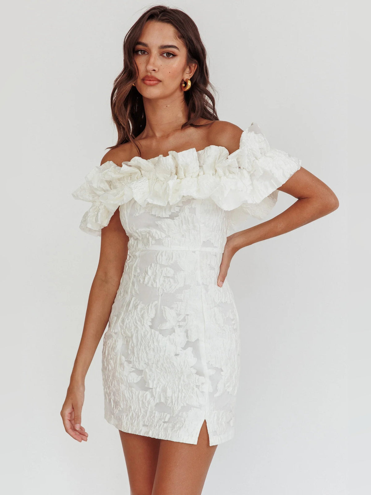 White off-shoulder mini homecoming dress with voluminous ruffle neckline and textured front