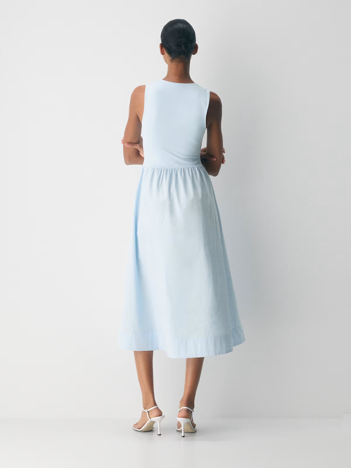 Teal sleeveless midi dress with gathered waist and rounded back