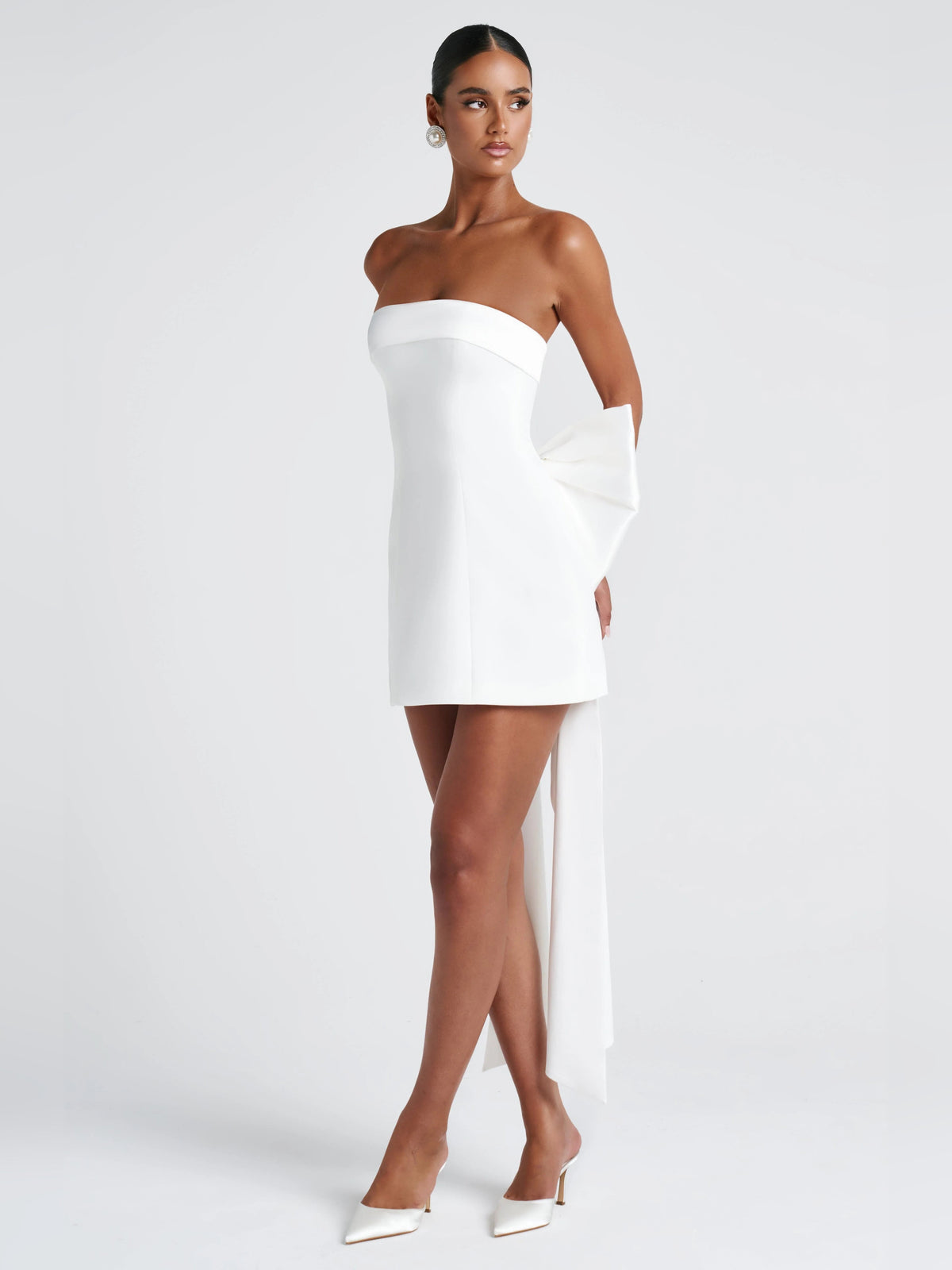 Ivory strapless mini dress with long side drape and folded waistband