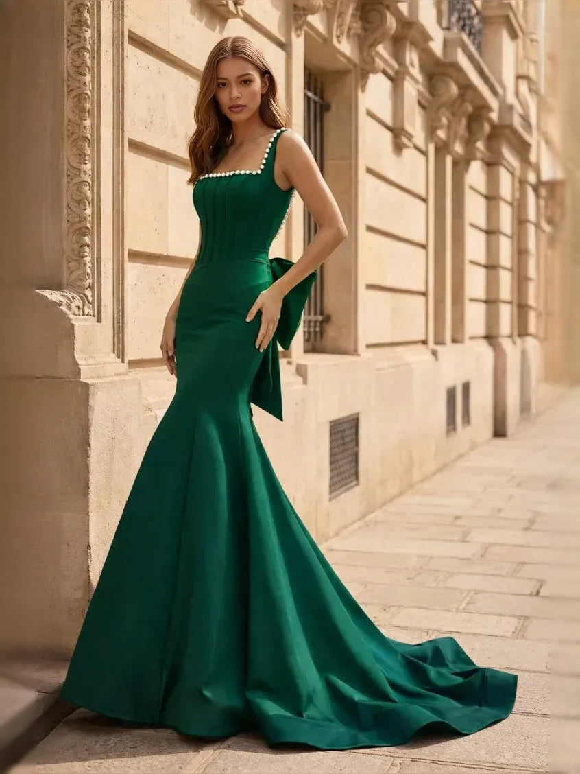 Emerald green corset bow square-neck mermaid satin prom dress with pearl-trim straps