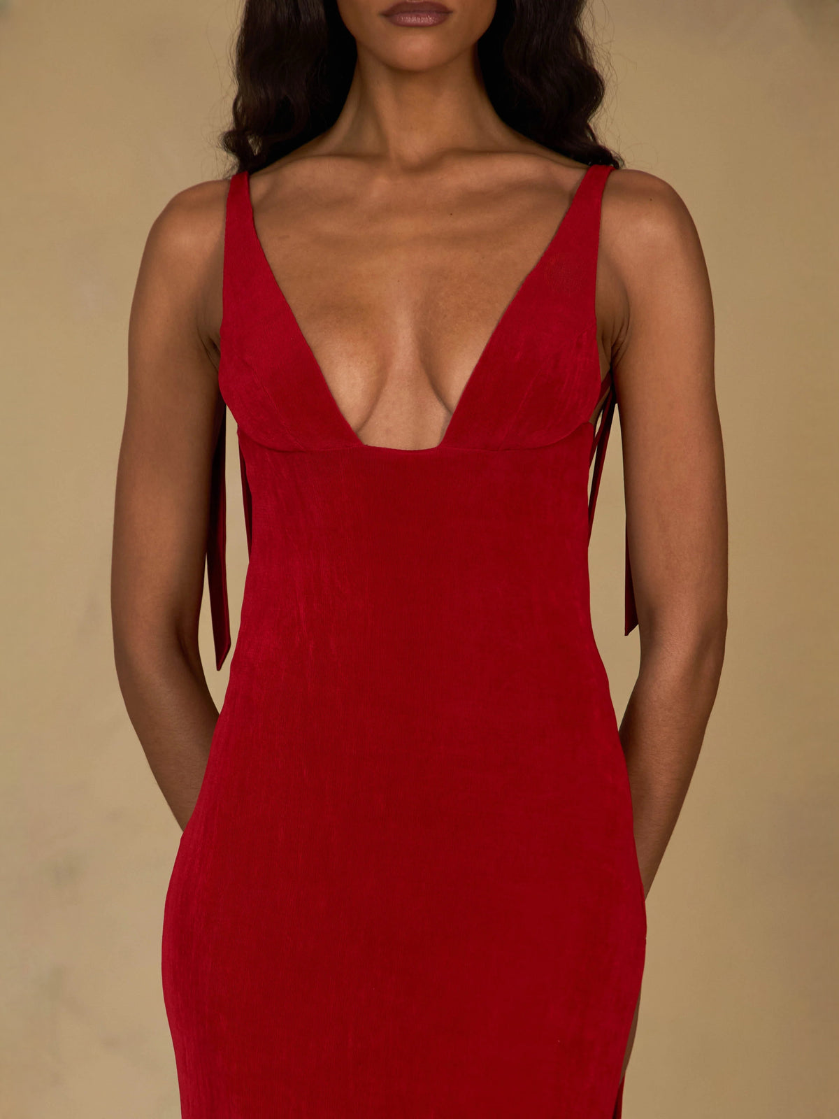 Red velvet V-neck prom dress with spaghetti straps and fitted mermaid shape