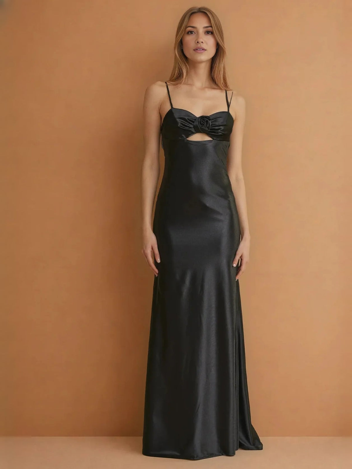 Black satin mermaid prom dress with sweetheart neckline and rosette-bow bodice