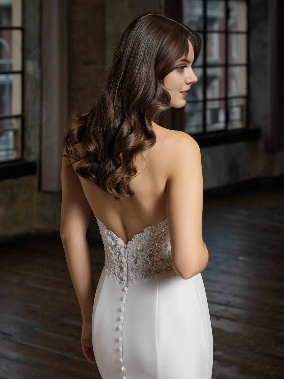 Ivory strapless mermaid wedding dress with beaded lace back detail and satin skirt