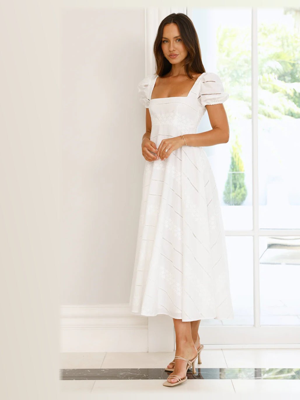 White formal dress with a-line detailing