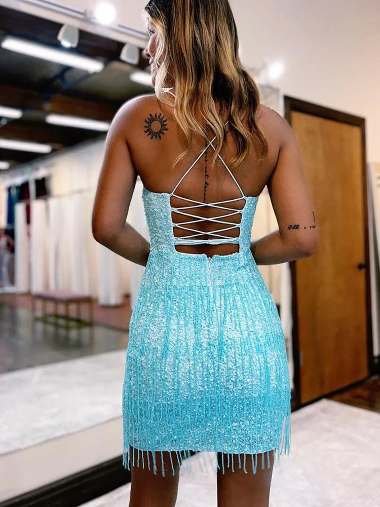 Light blue sequin mini dress with lace-up open back and fringe hem