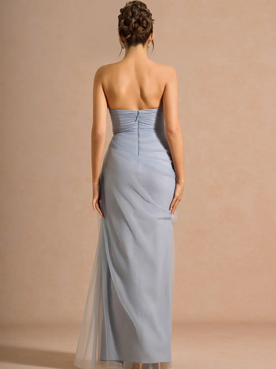 Off-shoulder formal dress in powder blue, open back with ruched seam and long skirt