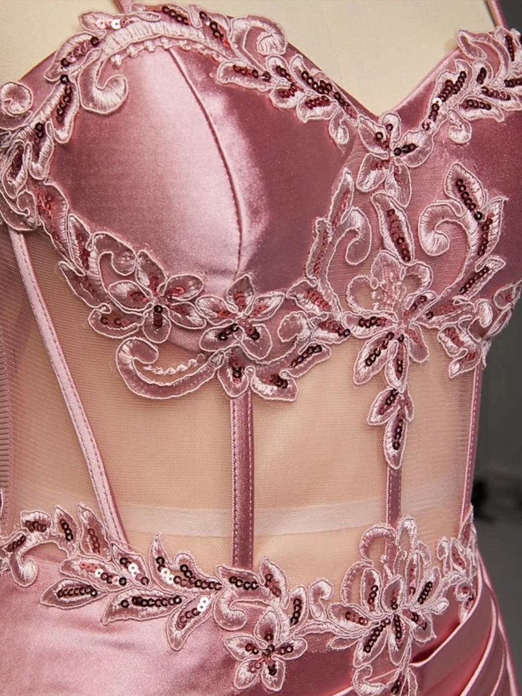 Rose gold satin sweetheart bodice with intricate lace applique and floral embroidery