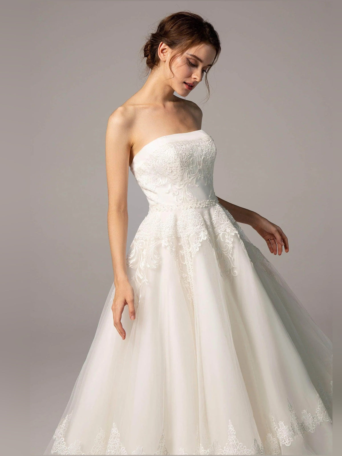 Ivory strapless A-line short wedding dress with lace applique bodice and flared skirt