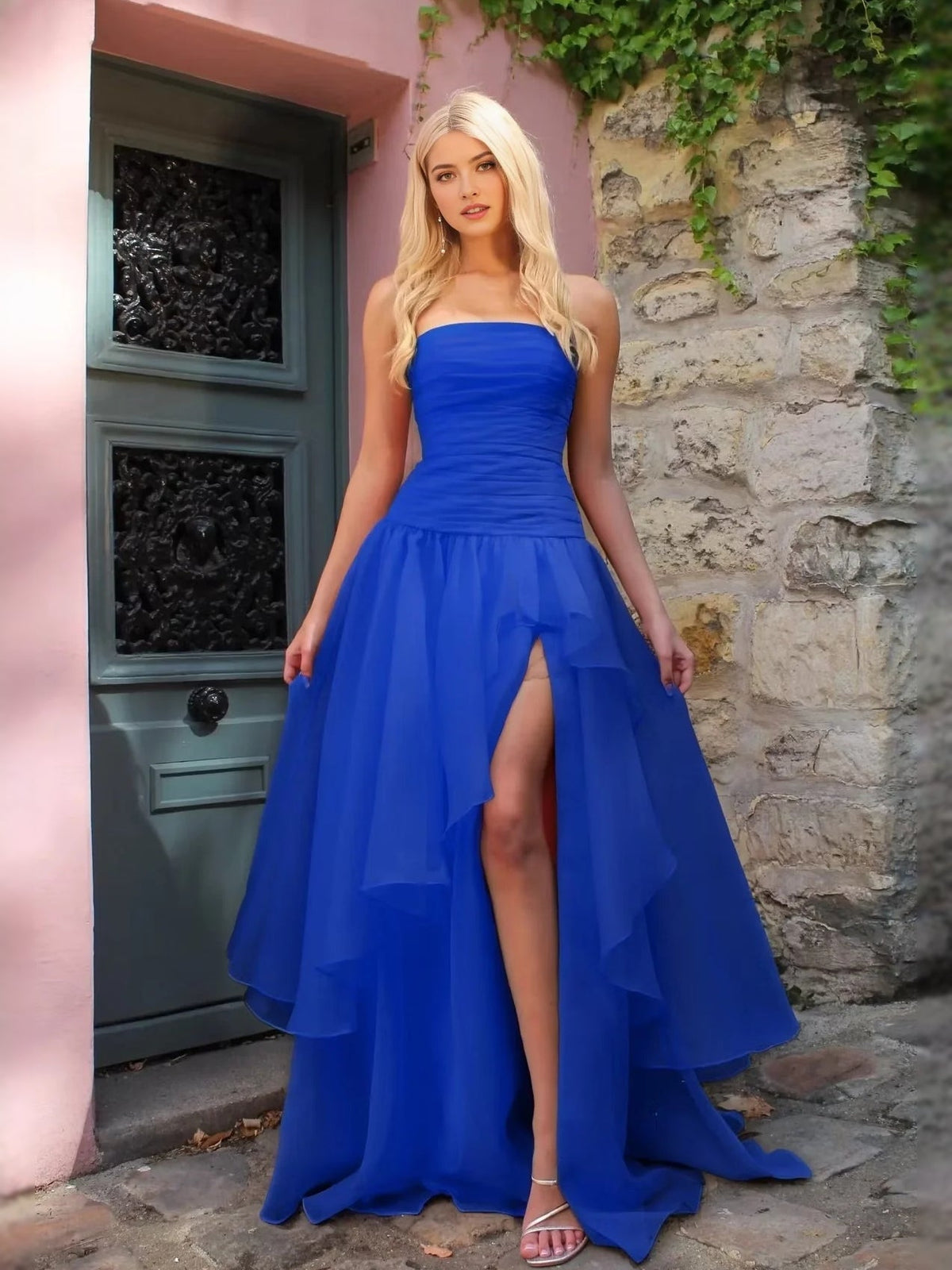 Navy blue strapless ruched prom dress with layered A-line skirt and front slit