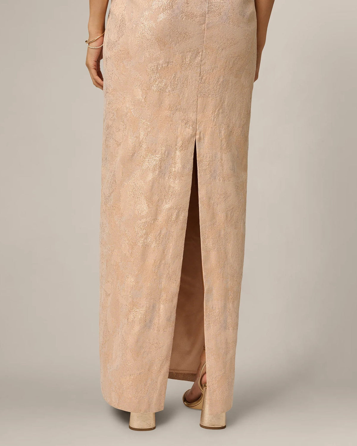 Champagne shimmer sheath maxi dress with front slit and straight maxi hem