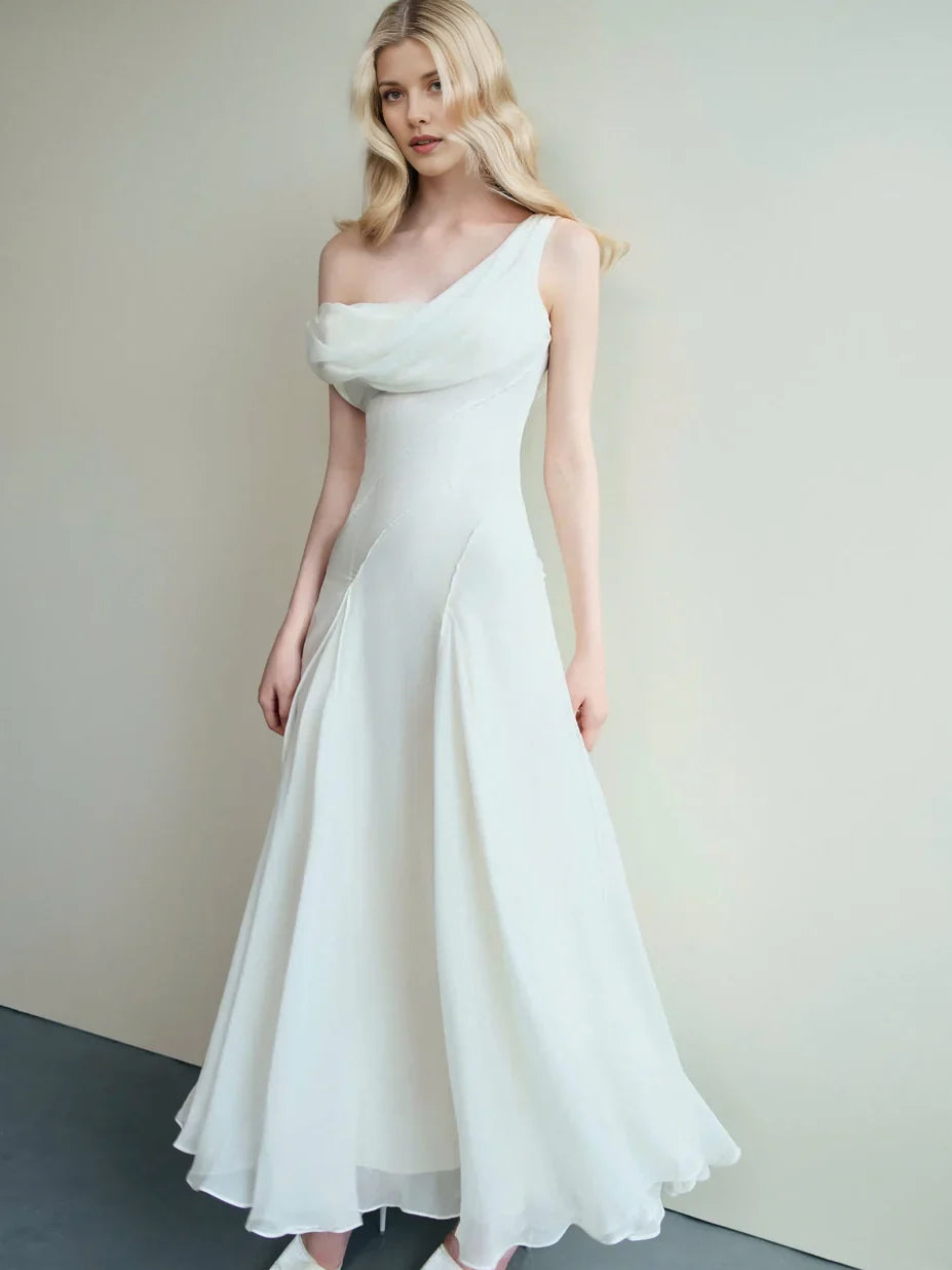 Ivory chiffon maxi dress with draped cowl neckline and flowing A-line skirt
