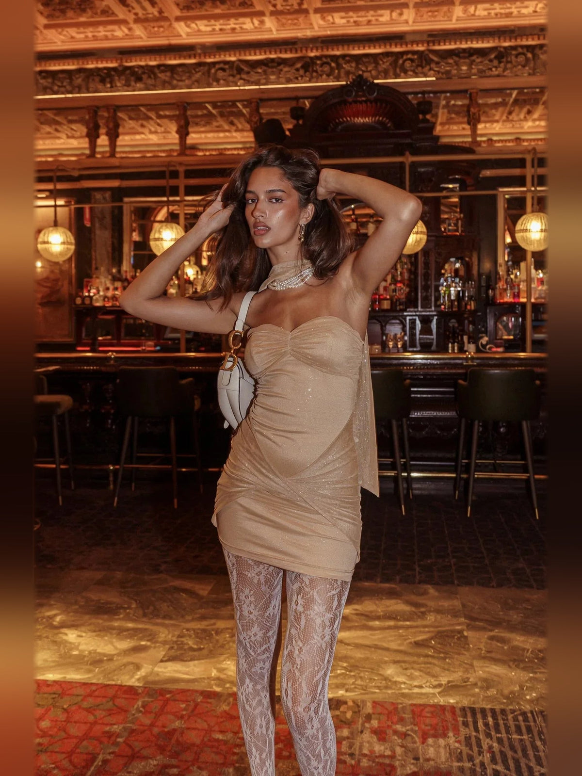 Gold glitter ruched sweetheart bodycon mini dress with draped halter wrap