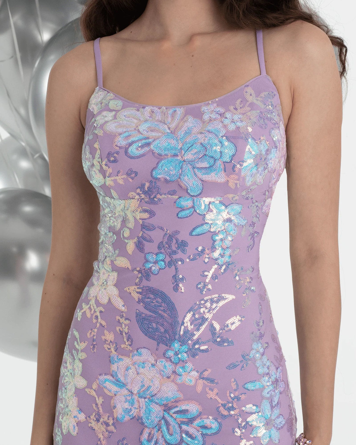 Purple sequin mermaid maxi prom dress bodice close-up, blue floral sequin accents