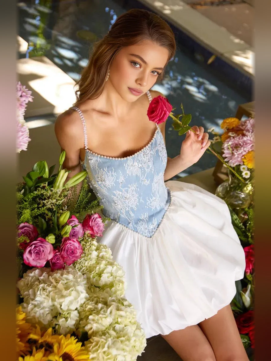 Light blue beaded sweetheart mini dress with spaghetti straps and white voluminous puff skirt