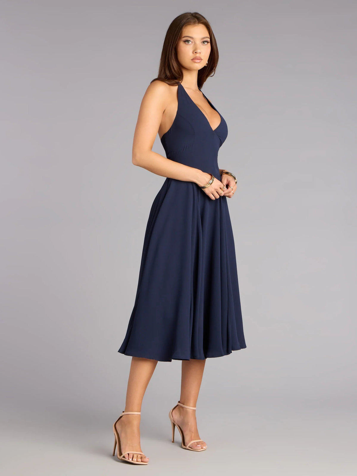 Blue chiffon midi formal dress with sleeveless halter neckline and flowing skirt