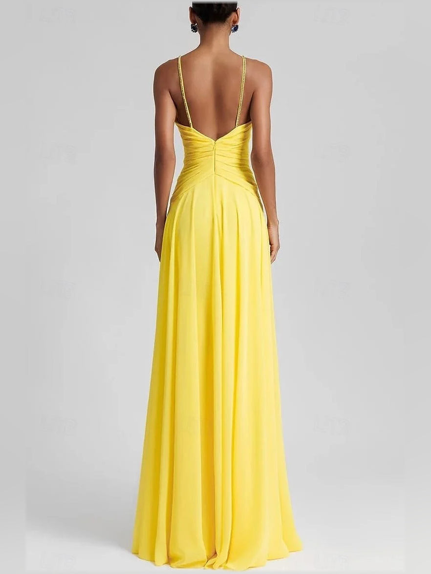 Canary yellow halter neck maxi chiffon prom dress with open back and gathered waist